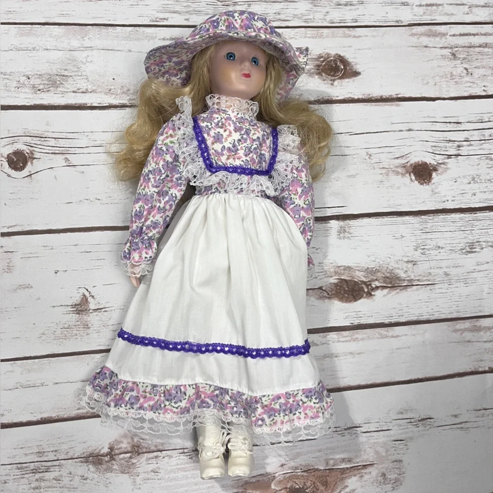 Porcelain Doll with purple floral dress and‎ Hat vintage